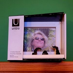 Umbra White Photo Frame with Bronze "Star-struck" figures gazing at photo